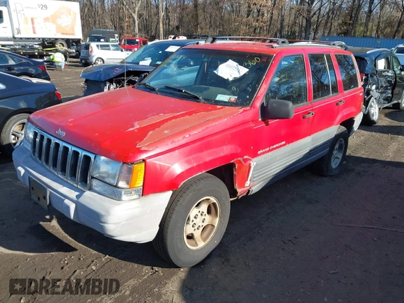 1997 Jeep Grand Cherokee Laredo with VIN 1J4GZ58S0VC550242, listed as a IAAI auction lot 41032114 with 185,307 mi miles. Bid and sale history available at carsss.com. Image 6.