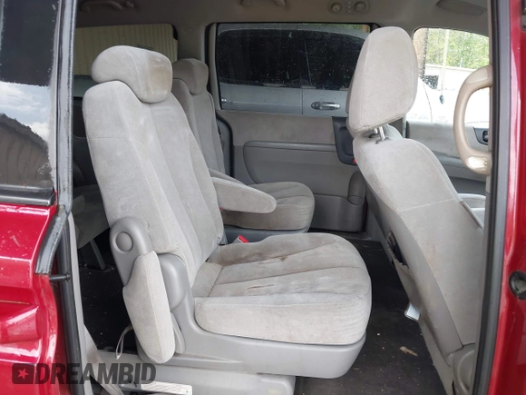 2009 Kia Sedona LX with VIN KNDMB233X96277536, listed as a IAAI auction lot 42108653 with 260,258 mi miles. Bid and sale history available at carsss.com. Image 8.