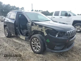 2019 Jeep Cherokee Latitude Plus with VIN 1C4PJLLB7KD247005, listed as a Copart auction lot 61600615 with 75,210 mi miles and Salvage title. Bid and sale history available at DreamBid. Image 4.