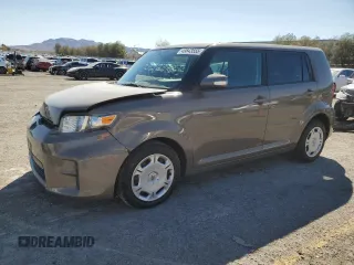 2012 Scion xB with VIN JTLZE4FE6CJ023059, listed as a Copart auction lot 49843555 with 145,371 mi miles and Salvage Title. Bid and sale history available at carsss.com. Image 1.