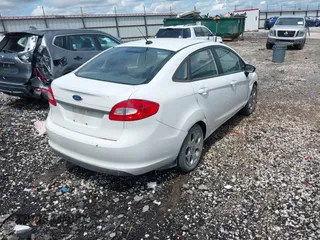 2013 Ford Fiesta S с VIN 3FADP4AJ6DM164759, выставлен на аукционе IAAI как лот 42160809 с пробегом 155 083 миль миль и . История ставок и продаж доступна на DreamBid. Изображение 4.