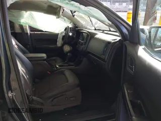2015 GMC Canyon 2WD SLE with VIN 1GTG5BE37F1265497, listed as a IAAI auction lot 41507236 with 101,385 mi miles. Bid and sale history available at carsss.com. Image 5.