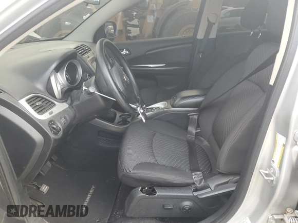 2014 Dodge Journey SXT with VIN 3C4PDCBG5ET227189, listed as a Copart auction lot 88994355 with 166,989 mi miles and Salvage Title. Bid and sale history available at carsss.com. Image 7.