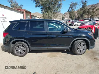 2019 Honda Passport EX-L with VIN 5FNYF7H58KB005624, listed as a IAAI auction lot 41344058 with 63,867 mi miles and . Bid and sale history available at carsss.com. Image 13.