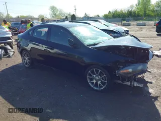 2014 Dodge Dart SXT with VIN 1C3CDFBB5ED909827, listed as a IAAI auction lot 42133689 with 100,214 mi miles. Bid and sale history available at carsss.com. Image 1.