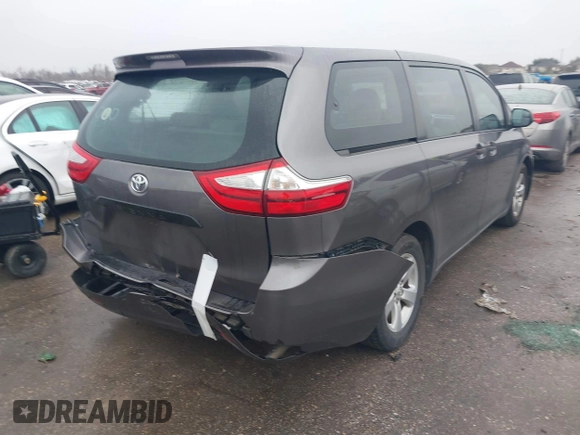 2015 Toyota Sienna L with VIN 5TDZK3DC9FS563593, listed as a IAAI auction lot 41466419 with 136,394 mi miles and . Bid and sale history available at DreamBid. Image 4.