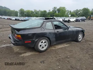 1987 Porsche 944 z VIN WP0AB0946HN474232, wystawiony jako Copart lot #64654684 z przebiegiem 87 126 mil mil oraz Szkoda całkowita • Salvage title. Historia ofert i sprzedaży dostępna na DreamBid. Obrazek 3.