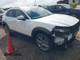 2023 Mazda CX-30 S Select with VIN 3MVDMBBM7PM551775, listed as a IAAI auction lot 42261587 with 53,228 mi miles and . Bid and sale history available at DreamBid. Image 1.