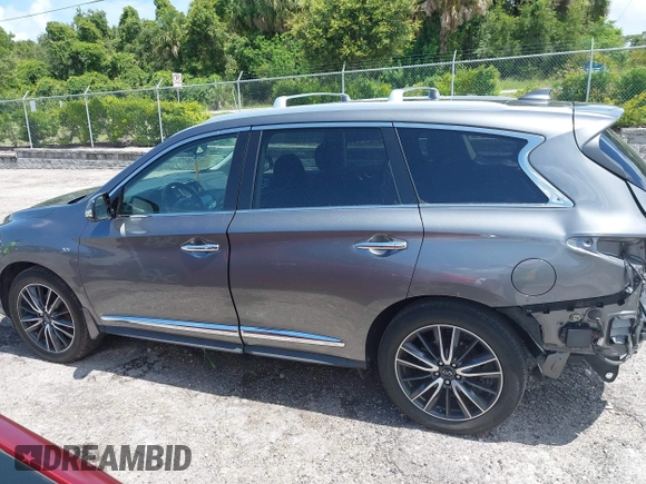 2019 Infiniti QX60 Pure with VIN 5N1DL0MNXKC512120, listed as a IAAI auction lot 42552676 with 88,944 mi miles and . Bid and sale history available at DreamBid. Image 14.