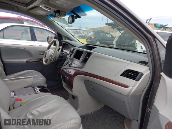 2012 Toyota Sienna XLE AAS with VIN 5TDYK3DC0CS252965, listed as a IAAI auction lot 42059909 with 321,983 mi miles and . Bid and sale history available at carsss.com. Image 5.
