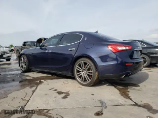 2015 Maserati Ghibli with VIN ZAM57XSA6F1146076, listed as a Copart auction lot 52474303 with 82,575 mi miles. Bid and sale history available at carsss.com. Image 2.