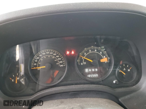 2015 Jeep Patriot North with VIN 1C4NJRAB7FD311725, listed as a Copart auction lot 82647074 with 185,560 mi miles and Salvage Title. Bid and sale history available at carsss.com. Image 9.