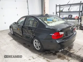 2008 BMW 3 Series 328xi with VIN WBAVC93538K043317, listed as a IAAI auction lot 41544348 with 127,823 mi miles. Bid and sale history available at carsss.com. Image 3.