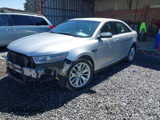 2015 Ford Taurus Limited with VIN 1FAHP2F81FG130088, listed as a IAAI auction lot 41738245 with 87,964 mi miles. Bid and sale history available at carsss.com. Image 2.