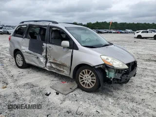 2010 Toyota Sienna XLE with VIN 5TDYK4CC1AS322395, listed as a Copart auction lot 60520215 with 148,725 mi miles and Salvage title. Bid and sale history available at DreamBid. Image 4.
