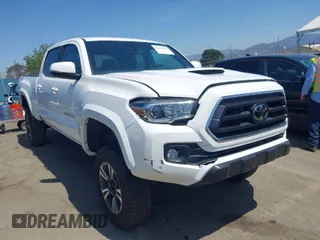 2021 Toyota Tacoma 4WD SR5 with VIN 3TMDZ5BN4MM106693, listed as a IAAI auction lot 41986838 with 52,510 mi miles. Bid and sale history available at carsss.com. Image 1.