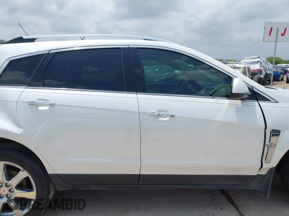 2012 Cadillac SRX Premium Collection с VIN 3GYFNCE36CS557597, выставлен на аукционе IAAI как лот 42115362 с пробегом 122 434 миль миль и . История ставок и продаж доступна на DreamBid. Изображение 14.