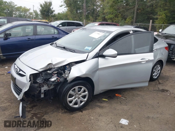 2012 Hyundai Accent GLS z VIN KMHCT4AE8CU197739, wystawiony jako IAAI lot #37738877 z przebiegiem 158 688 mil mil oraz . Historia ofert i sprzedaży dostępna na DreamBid. Obrazek 2.