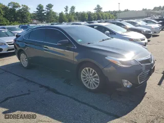 2015 Toyota Avalon Hybrid XLE Touring with VIN 4T1BD1EBXFU041133, listed as a Copart auction lot 60879263 with 114,863 mi miles. Bid and sale history available at carsss.com. Image 4.