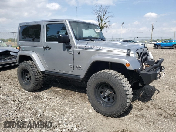 2014 Jeep Wrangler Sahara with VIN 1C4AJWBG0EL241643, listed as a Copart auction lot 56491155 with 113,596 mi miles and Salvage title. Bid and sale history available at DreamBid. Image 4.
