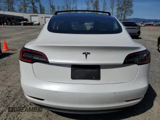 2019 Tesla Model 3 Mid Range with VIN 5YJ3E1EA0KF484178, listed as a Copart auction lot 53121915 with 64,929 mi miles and Salvage Title. Bid and sale history available at DreamBid. Image 6.