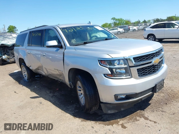 2017 Chevrolet Suburban LT z VIN 1GNSKHKC9HR268651, wystawiony jako IAAI lot #42125406 z przebiegiem 174 451 mil mil oraz . Historia ofert i sprzedaży dostępna na DreamBid. Obrazek 1.