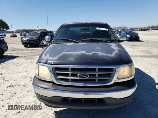 2000 Ford F-150 XL with VIN 1FTZX1725YNC28381, listed as a Copart auction lot 50144275 with 0 mi miles and Non Repairable. Bid and sale history available at carsss.com. Image 5.