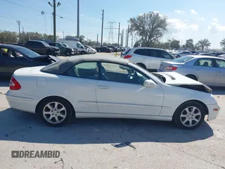 2004 Mercedes-Benz CLK 320 z VIN WDBTK65GX4T018556, wystawiony jako IAAI lot #41546296 z przebiegiem 100 585 mil mil oraz . Historia ofert i sprzedaży dostępna na DreamBid. Obrazek 13.