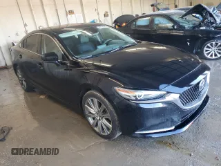 2021 Mazda 6 Carbon Edition with VIN JM1GL1WY9M1605756, listed as a Copart auction lot 46778355 with 60,063 mi miles and Salvage Title. Bid and sale history available at DreamBid. Image 4.
