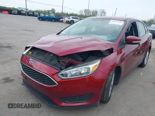 2016 Ford Focus SE with VIN 1FADP3F2XGL377909, listed as a IAAI auction lot 42144566 with 94,045 mi miles and . Bid and sale history available at carsss.com. Image 2.