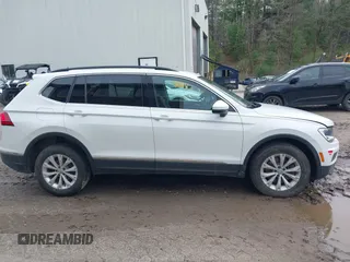 2018 Volkswagen Tiguan SEL z VIN 3VV2B7AX5JM164450, wystawiony jako IAAI lot #42191718 z przebiegiem 68 556 mil mil oraz . Historia ofert i sprzedaży dostępna na DreamBid. Obrazek 13.