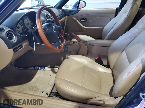 2001 Mazda MX-5 Miata with VIN JM1NB353510209224, listed as a Copart auction lot 51736955 with 103,732 mi miles and Salvage Title. Bid and sale history available at DreamBid. Image 7.