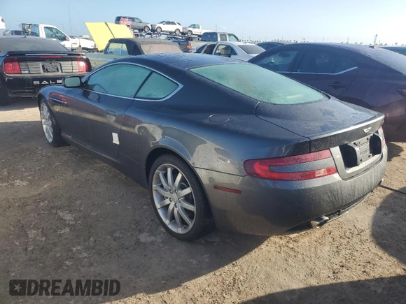 2005 Aston Martin DB9 z VIN SCFAD01A75GA02198, wystawiony jako Copart lot #75564554 z przebiegiem Nie podano mil oraz Nie do naprawy • Non repairable. Historia ofert i sprzedaży dostępna na DreamBid. Obrazek 2.