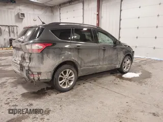 2018 Ford Escape SE with VIN 1FMCU9GD8JUA53114, listed as a IAAI auction lot 41592808 with 167,659 mi miles. Bid and sale history available at carsss.com. Image 4.