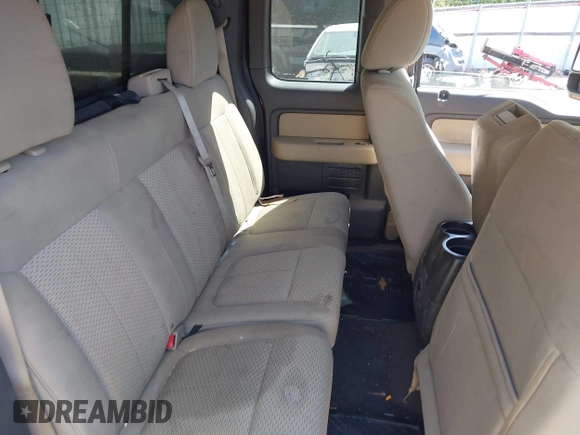 2010 Ford F-150 XL with VIN 1FTFX1EV6AFC58618, listed as a IAAI auction lot 42029696 with 128,258 mi miles. Bid and sale history available at carsss.com. Image 7.