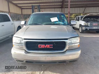 2003 GMC Yukon SLT with VIN 1GKEC13Z43R163266, listed as a IAAI auction lot 41540592 with 173,804 mi miles. Bid and sale history available at carsss.com. Image 6.