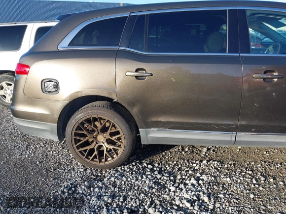 2011 Lincoln MKT with VIN 2LMHJ5AR8BBJ54371, listed as a IAAI auction lot 41147331 with 111,347 mi miles and . Bid and sale history available at DreamBid. Image 6.