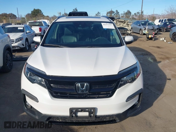 2022 Honda Pilot Special Edition with VIN 5FNYF5H20NB034677, listed as a IAAI auction lot 41372317 with 28,708 mi miles and . Bid and sale history available at carsss.com. Image 12.