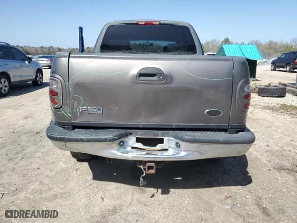 2002 Ford F-150 XLT with VIN 1FTRW07L32KA75868, listed as a Copart auction lot 47392685 with 0 mi miles and Salvage Title. Bid and sale history available at carsss.com. Image 6.