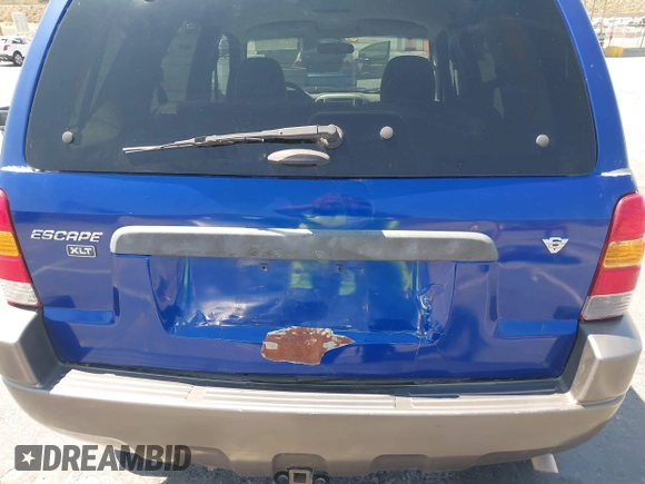 2005 Ford Escape XLT with VIN 1FMYU03155KB63374, listed as a IAAI auction lot 42739496 with 128,768 mi miles and . Bid and sale history available at DreamBid. Image 6.