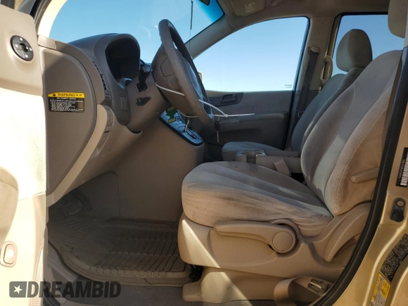 2008 Kia Sedona LX with VIN KNDMB233386231965, listed as a Copart auction lot 66211254 with 218,599 mi miles and Salvage Title. Bid and sale history available at carsss.com. Image 7.