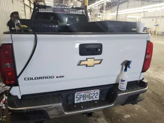 2018 Chevrolet Colorado 4WD Work Truck with VIN 1GCHTBEN7J1252687, listed as a IAAI auction lot 42802221 with 102,143 mi miles and . Bid and sale history available at DreamBid. Image 25.