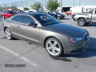 2014 Audi A5 Premium Plus with VIN WAULFAFR0EA021534, listed as a IAAI auction lot 42190914 with 122,292 mi miles and . Bid and sale history available at DreamBid. Image 1.