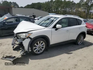 2015 Mazda CX-5 Grand Touring with VIN JM3KE4DY0F0458719, listed as a Copart auction lot 52960365 with 128,372 mi miles and Salvage Title. Bid and sale history available at DreamBid. Image 1.