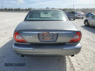 2004 Jaguar XJ 8 with VIN SAJWA71C84SG17802, listed as a Copart auction lot 76880914 with Not Provided miles and Non Repairable. Bid and sale history available at DreamBid. Image 6.