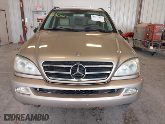 2005 Mercedes-Benz M 500 with VIN 4JGAB75E05A525942, listed as a IAAI auction lot 42012823 with 176,682 mi miles and . Bid and sale history available at DreamBid. Image 6.