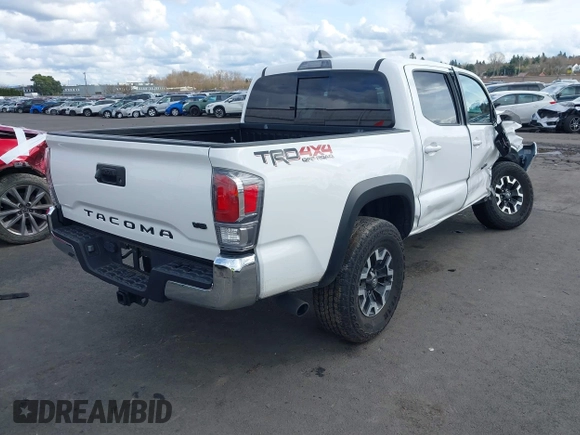 2023 Toyota Tacoma SR z VIN 3TMCZ5AN0PM541700, wystawiony jako IAAI lot #41819408 z przebiegiem 14 216 mil mil oraz . Historia ofert i sprzedaży dostępna na DreamBid. Obrazek 4.
