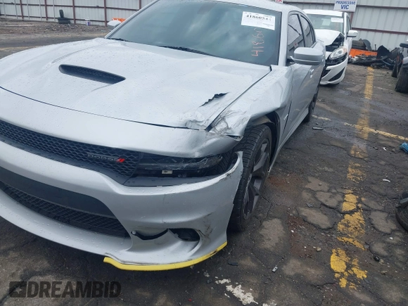 2019 Dodge Charger R/T with VIN 2C3CDXCTXKH757197, listed as a IAAI auction lot 41860544 with 98,820 mi miles and . Bid and sale history available at DreamBid. Image 6.
