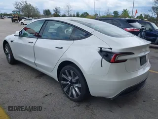 2024 Tesla Model 3 with VIN 5YJ3E1EA6RF751009, listed as a IAAI auction lot 40537919 with Not Provided miles and . Bid and sale history available at DreamBid. Image 3.