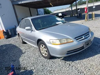 2002 Honda Accord SE z VIN 1HGCG66812A031636, wystawiony jako IAAI lot #42317789 z przebiegiem 306 323 mil mil oraz . Historia ofert i sprzedaży dostępna na DreamBid. Obrazek 1.